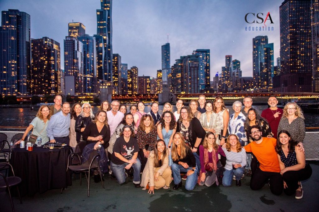 CSA Education staff members with the Chicago skyline in the background